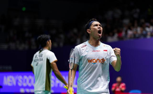 (260726) -- CHANGZHOU, July 26, 2026 (Xinhua) -- Fajar Alfian (R)/Muhammad Shohibul Fikri celebrate a score during the men's doubles final match between Fajar Alfian/Muhammad Shohibul Fikri of Indonesia and Kim Won Ho/Seo Seung Jae of South Korea at the China Open 2026 badminton tournament in Changzhou, east China's Jiangsu Province, July 26, 2026. (Xinhua/Sun Fei)