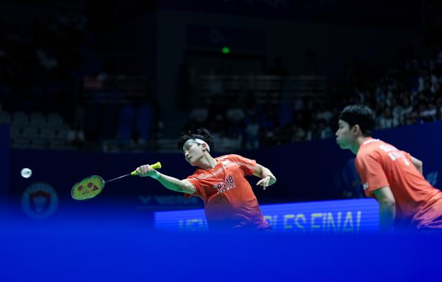 (260726) -- CHANGZHOU, July 26, 2026 (Xinhua) -- Kim Won Ho (L)/Seo Seung Jae compete during the men's doubles final match between Fajar Alfian/Muhammad Shohibul Fikri of Indonesia and Kim Won Ho/Seo Seung Jae of South Korea at the China Open 2026 badminton tournament in Changzhou, east China's Jiangsu Province, July 26, 2026. (Xinhua/Sun Fei)