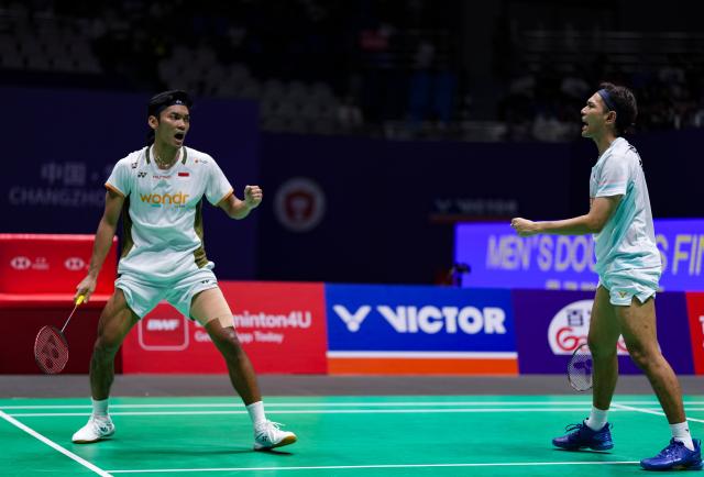(260726) -- CHANGZHOU, July 26, 2026 (Xinhua) -- Fajar Alfian (R)/Muhammad Shohibul Fikri celebrate a score during the men's doubles final match between Fajar Alfian/Muhammad Shohibul Fikri of Indonesia and Kim Won Ho/Seo Seung Jae of South Korea at the China Open 2026 badminton tournament in Changzhou, east China's Jiangsu Province, July 26, 2026. (Xinhua/Sun Fei)