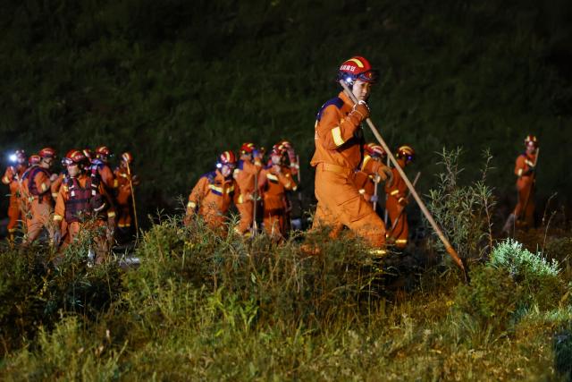 (260726) -- WEIYUAN, July 26, 2026 (Xinhua) -- Rescue operations are underway at the flood-hit area in Weiyuan County, northwest China's Gansu Province, July 26, 2026. China's office of the State Flood Control and Drought Relief Headquarters and the Ministry of Emergency Management (MEM) have dispatched a work team to northwest China's Gansu Province on Sunday to guide local relief efforts after a flash flood caused casualties.
  The headquarters has activated a Level-IV flood prevention emergency response for the province, the MEM said.
  The flash flood, triggered by sudden heavy rainfall, hit a scenic area in Weiyuan County, Dingxi City, on Sunday afternoon, leaving 10 people dead and 23 injured as of 6 p.m. (Xinhua/Chen Bin)