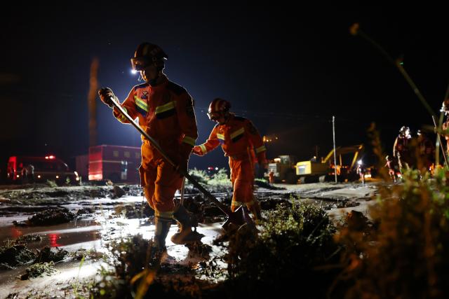 (260726) -- WEIYUAN, July 26, 2026 (Xinhua) -- Rescue operations are underway at the flood-hit area in Weiyuan County, northwest China's Gansu Province, July 26, 2026. China's office of the State Flood Control and Drought Relief Headquarters and the Ministry of Emergency Management (MEM) have dispatched a work team to northwest China's Gansu Province on Sunday to guide local relief efforts after a flash flood caused casualties.
  The headquarters has activated a Level-IV flood prevention emergency response for the province, the MEM said.
  The flash flood, triggered by sudden heavy rainfall, hit a scenic area in Weiyuan County, Dingxi City, on Sunday afternoon, leaving 10 people dead and 23 injured as of 6 p.m. (Xinhua/Chen Bin)
