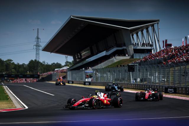 (260727) -- MOGYOROD, July 27, 2026 (Xinhua) -- Ferrari's Lewis Hamilton of Britain (front) competes during the race of the Formula One Hungarian Grand Prix at the Hungaroring in Mogyorod, near Budapest, Hungary, July 26, 2026. (Photo by David Balogh/Xinhua)