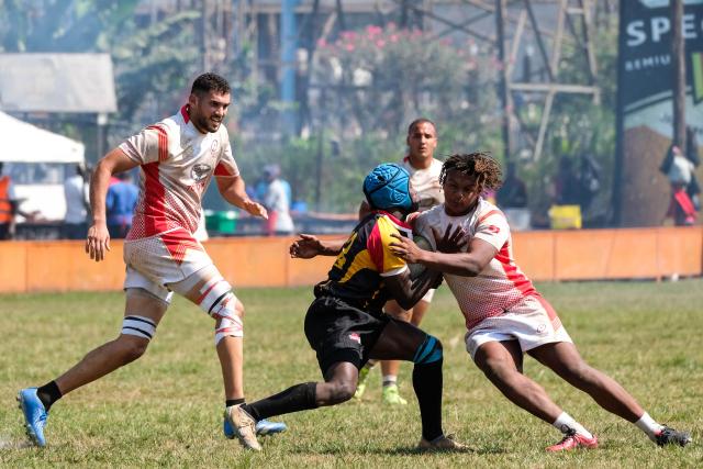 (260727) -- KAMPALA, July 27, 2026 (Xinhua) -- Players of both sides compete during an international U20 rugby test match between Uganda and Tunisia held for the upcoming 2026 Barthes Trophy in Kampala, Uganda on July 26, 2026. The Barthes Trophy, which will take place from August 4 to 17, is the only national-level junior rugby tournament in Africa, with eight U20 teams competing for the title. (Photo by Hajarah Nalwadda/Xinhua)