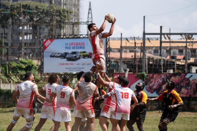 (260727) -- KAMPALA, July 27, 2026 (Xinhua) -- Players of both sides compete during an international U20 rugby test match between Uganda and Tunisia held for the upcoming 2026 Barthes Trophy in Kampala, Uganda on July 26, 2026. The Barthes Trophy, which will take place from August 4 to 17, is the only national-level junior rugby tournament in Africa, with eight U20 teams competing for the title. (Photo by Hajarah Nalwadda/Xinhua)