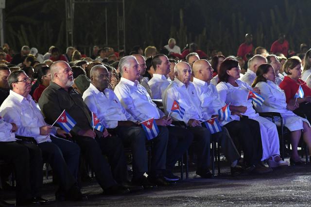 (260727) -- PINAR DEL RIO, July 27, 2026 (Xinhua) -- Cuban President Miguel Diaz-Canel (4th L, front) attends a ceremony marking the 73rd anniversary of the National Rebellion Day in Pinar del Rio, Cuba, July 26, 2026. The National Rebellion Day marks events on July 26, 1953, when late revolutionary leader Fidel Castro and about 100 of his followers attempted to take the Moncada Barracks, the second military fortress of the Fulgencio Batista's dictatorship, in the city of Santiago de Cuba, and the Carlos Manuel de Cespedes Barracks in the nearby town of Bayamo. (Photo by Joaquin Hernandez/Xinhua)