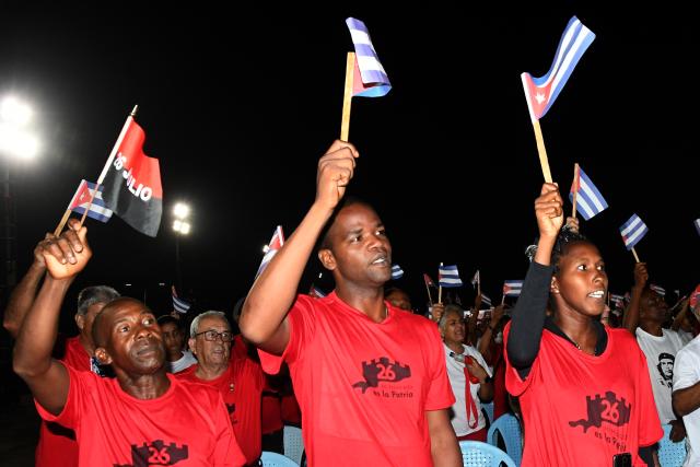 (260727) -- PINAR DEL RIO, July 27, 2026 (Xinhua) -- People attend a ceremony marking the 73rd anniversary of the National Rebellion Day in Pinar del Rio, Cuba, July 26, 2026. The National Rebellion Day marks events on July 26, 1953, when late revolutionary leader Fidel Castro and about 100 of his followers attempted to take the Moncada Barracks, the second military fortress of the Fulgencio Batista's dictatorship, in the city of Santiago de Cuba, and the Carlos Manuel de Cespedes Barracks in the nearby town of Bayamo. (Photo by Joaquin Hernandez/Xinhua)