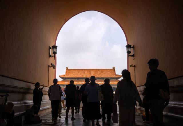 (260727) -- BEIJING, July 27, 2026 (Xinhua) -- People visit the Palace Museum in Beijing, capital of China, July 27, 2026. The Palace Museum opened to the public free of charge on Monday to mark the second anniversary of the successful inscription of the Beijing Central Axis on the UNESCO World Heritage List. (Xinhua/Jin Liangkuai)