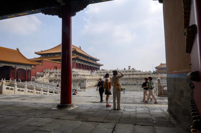 (260727) -- BEIJING, July 27, 2026 (Xinhua) -- People visit the Palace Museum in Beijing, capital of China, July 27, 2026. The Palace Museum opened to the public free of charge on Monday to mark the second anniversary of the successful inscription of the Beijing Central Axis on the UNESCO World Heritage List. (Xinhua/Jin Liangkuai)