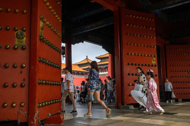 (260727) -- BEIJING, July 27, 2026 (Xinhua) -- People visit the Palace Museum in Beijing, capital of China, July 27, 2026. The Palace Museum opened to the public free of charge on Monday to mark the second anniversary of the successful inscription of the Beijing Central Axis on the UNESCO World Heritage List. (Xinhua/Jin Liangkuai)