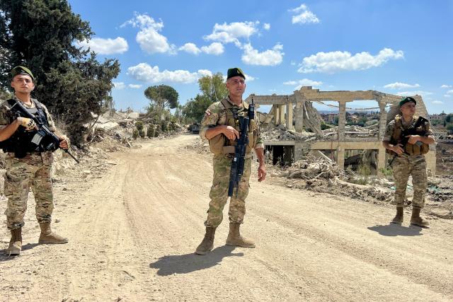 (260727) -- ZAWTAR AL, July 27, 2026 (Xinhua) -- Lebanese army soldiers stand guard to ensure the safety of residents returning to the town of Zawtar al-Gharbiyah, southern Lebanon, July 26, 2026. The Lebanese army said Sunday that continued Israeli attacks and violations of existing understandings are obstructing its deployment in southern Lebanon and delaying the return of residents to their border villages. (Photo by Ali Hashisho/Xinhua)