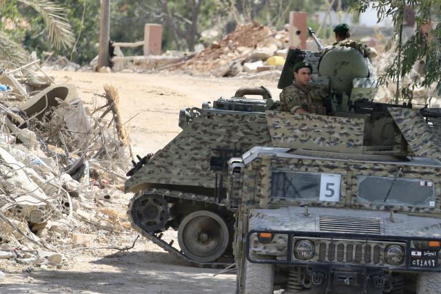 (260727) -- ZAWTAR AL, July 27, 2026 (Xinhua) -- Lebanese army soldiers are deployed to ensure the safety of residents returning to the town of Zawtar al-Gharbiyah, southern Lebanon, July 26, 2026. The Lebanese army said Sunday that continued Israeli attacks and violations of existing understandings are obstructing its deployment in southern Lebanon and delaying the return of residents to their border villages. (Photo by Ali Hashisho/Xinhua)