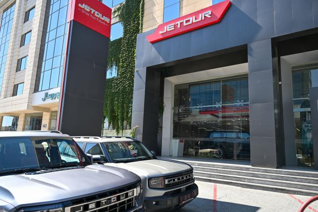 (260727) -- AMMAN, July 27, 2026 (Xinhua) -- This photo taken on July 21, 2026 shows a view of a dealership for Chinese automaker Jetour in Amman, Jordan. As the economic and trade cooperation and cultural exchanges between China and Jordan continue to deepen, a growing number of Chinese elements have found their way into the daily lives of Jordanians. (Xinhua/Xin Mengchen)