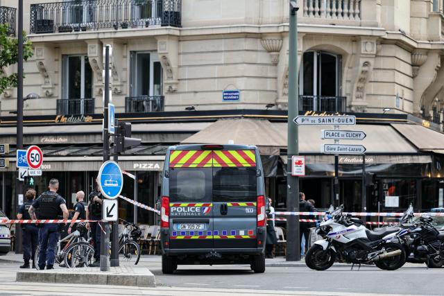 (260727) -- PARIS, July 27, 2026 (Xinhua) -- Policemen and police vehicles are seen near the site of a knife attack in Paris, France, July 27, 2026. Three people were injured in a knife attack in Paris on Monday, and a male suspect was arrested.
   The attack occurred at around 11:30 a.m. local time in northwestern Paris, where a man armed with two kitchen knives attacked passersby on the street. The victims received medical treatment, with two of them in critical condition, according to French media reports. (Xinhua/Wu Huiwo)