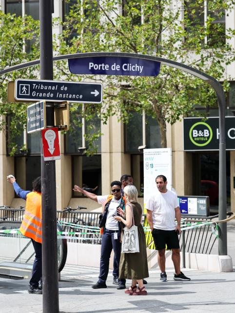 (260727) -- PARIS, July 27, 2026 (Xinhua) -- A closed entry to a metro station is pictured near the site of a knife attack in Paris, France, July 27, 2026. Three people were injured in a knife attack in Paris on Monday, and a male suspect was arrested.
   The attack occurred at around 11:30 a.m. local time in northwestern Paris, where a man armed with two kitchen knives attacked passersby on the street. The victims received medical treatment, with two of them in critical condition, according to French media reports. (Xinhua/Wu Huiwo)