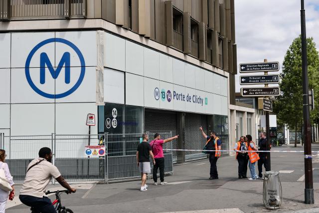 (260727) -- PARIS, July 27, 2026 (Xinhua) -- A closed entry to a metro station is pictured near the site of a knife attack in Paris, France, July 27, 2026. Three people were injured in a knife attack in Paris on Monday, and a male suspect was arrested.
   The attack occurred at around 11:30 a.m. local time in northwestern Paris, where a man armed with two kitchen knives attacked passersby on the street. The victims received medical treatment, with two of them in critical condition, according to French media reports. (Xinhua/Wu Huiwo)