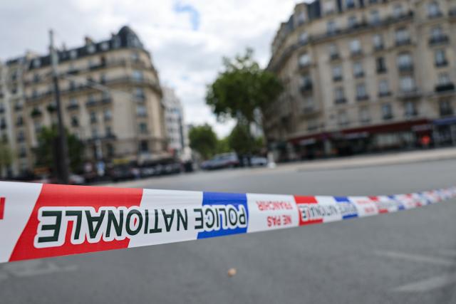 (260727) -- PARIS, July 27, 2026 (Xinhua) -- A police cordon is seen near the site of a knife attack in Paris, France, July 27, 2026. Three people were injured in a knife attack in Paris on Monday, and a male suspect was arrested.
   The attack occurred at around 11:30 a.m. local time in northwestern Paris, where a man armed with two kitchen knives attacked passersby on the street. The victims received medical treatment, with two of them in critical condition, according to French media reports. (Xinhua/Wu Huiwo)