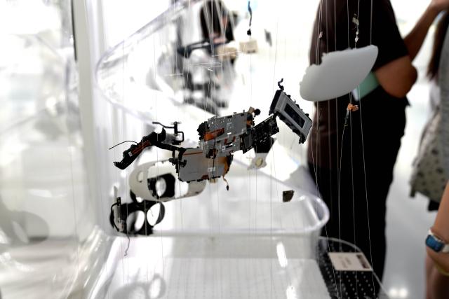 (260727) -- NINGBO, July 27, 2026 (Xinhua) -- This photo taken on July 27, 2026 shows parts of a VR device at the Yongjiang Laboratory (Y-LAB), in Ningbo, east China's Zhejiang Province. Focusing on new materials and related areas, the Yongjiang Laboratory (Y-LAB), launched by Zhejiang Province and Ningbo City, is committed to delivering cutting-edge basic research and leveraging technological innovations to support economic development. (Photo by Liu Zhihan/Xinhua)