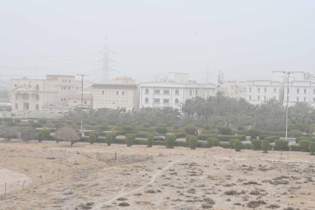 (260727) -- FARWANIYA GOVERNORATE, July 27, 2026 (Xinhua) -- Houses are seen shrouded by dust during a dust storm in Farwaniyah Governorate, Kuwait, July 27, 2026. (Photo by Asad/Xinhua)