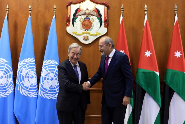 (260727) -- AMMAN, July 27, 2026 (Xinhua) -- Jordan's Deputy Prime Minister and Minister of Foreign Affairs and Expatriates Ayman Safadi (R) shakes hands with UN Secretary-General Antonio Guterres during their meeting in Amman, Jordan, July 27, 2026. (Photo by Mohammad Abu Ghosh/Xinhua)
