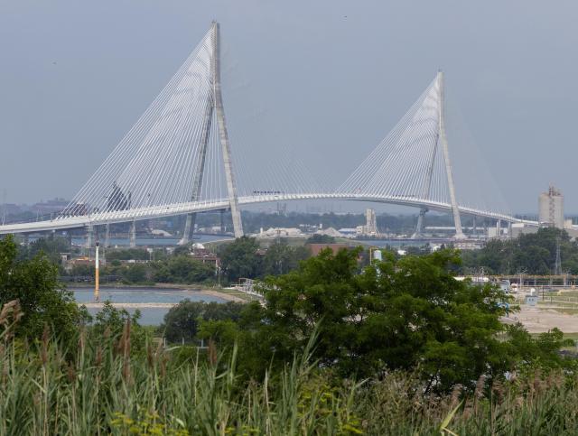 (260727) -- WINDSOR(CANADA), July 27, 2026 (Xinhua) -- The Gordie Howe International Bridge is seen from the Canadian side in Windsor, Ontario, Canada, on July 27, 2026. Canada on Monday opened a new international bridge linking Windsor, Ontario and Detroit, U.S., providing the newest and largest land border crossing with the United States despite escalating trade tensions between the two countries. (Photo by Zou Zheng/Xinhua)