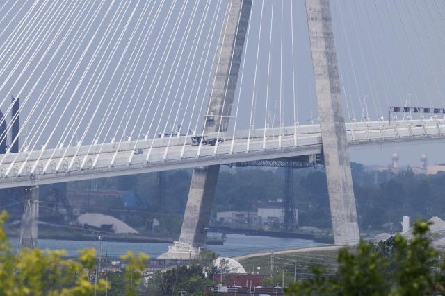(260727) -- WINDSOR(CANADA), July 27, 2026 (Xinhua) -- Vehicles runs over the Gordie Howe International Bridge seen from the Canadian side in Windsor, Ontario, Canada, on July 27, 2026. Canada on Monday opened a new international bridge linking Windsor, Ontario and Detroit, U.S., providing the newest and largest land border crossing with the United States despite escalating trade tensions between the two countries. (Photo by Zou Zheng/Xinhua)