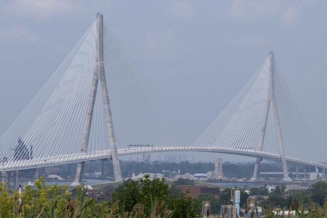 (260727) -- WINDSOR(CANADA), July 27, 2026 (Xinhua) -- The Gordie Howe International Bridge is seen from the Canadian side in Windsor, Ontario, Canada, on July 27, 2026. Canada on Monday opened a new international bridge linking Windsor, Ontario and Detroit, U.S., providing the newest and largest land border crossing with the United States despite escalating trade tensions between the two countries. (Photo by Zou Zheng/Xinhua)