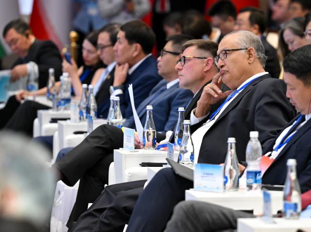 (260727) -- BISHKEK, July 27, 2026 (Xinhua) -- Guests attend the 2026 Shanghai Cooperation Organization (SCO) Media and Think Tank Summit in Bishkek, Kyrgyzstan, July 27, 2026.
  Themed "The Shanghai Spirit in the New Era: From Shared Values to Practical Cooperation," the summit opened here on Monday. It gathers about 260 representatives from nearly 150 mainstream media organizations, leading think tanks, government departments and the SCO Secretariat across SCO countries. (Xinhua/Feng Kaihua)