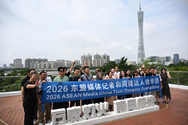 (260728) -- GUANGZHOU, July 28, 2026 (Xinhua) -- Journalists and social media influencers from ASEAN countries pose for a group photo at a science popularization center of a substation under China Southern Power Grid Co., Ltd. in Guangzhou, south China's Guangdong Province, July 27, 2026.
  Over 20 journalists and social media influencers from ASEAN countries started their visit tour in Guangdong on Monday.
  This year marks the fifth anniversary of the establishment of the China-ASEAN Comprehensive Strategic Partnership. (Xinhua/Deng Hua)