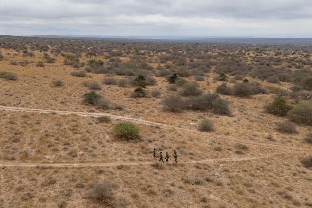 (260728) -- KAJIADO, July 28, 2026 (Xinhua) -- An aerial drone photo taken on July 22, 2026 shows members of Team Lioness patrolling at Ole Narika conservancy in Kajiado County, in Kenya, July 22, 2026. TO GO WITH "Feature: All-female rangers boost wildlife conservation efforts in Kenya's Amboseli" (Xinhua/Xie Jianfei)