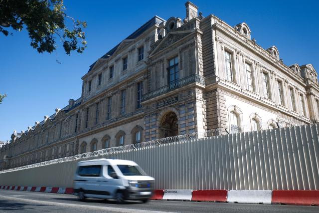 (260728) -- PARIS, July 28, 2026 (Xinhua) -- A vehicle drives near the Louvre Museum in Paris, France, July 28, 2026. French Culture Minister Catherine Pegard unveiled an action plan for heritage institutions and cultural property conservation sites on Monday. The plan focuses on strengthening the security of museums in the face of increasingly organized thefts. (Xinhua/Wu Huiwo)