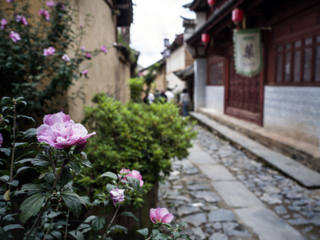 (260728) -- KUNMING, July 28, 2026 (Xinhua) -- This photo taken on July 26, 2026 shows an alleyway view in Lushi ancient town in Fengqing County of Lincang City in southwest China's Yunnan Province. Lushi ancient town in the northeast of Fengqing County lies between the Lancang River and Heihui River. Due to its special geographical location, Lushi was once an important trading hub on the ancient Tea Horse Road, a trade route dating back to the Tang Dynasty (618-907). The town has formed an unique culture that is influenced by merchants coming and going as well as multi-ethnic cohabitation. (Photo by Lan Hongguang/Xinhua)