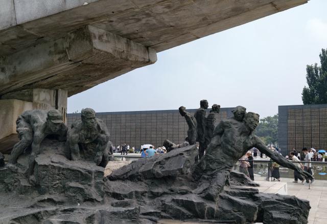 (260728) -- TANGSHAN, July 28, 2026 (Xinhua) -- People mourn in front of a memorial wall inscribed with names of the victims at the Tangshan Earthquake Memorial Park in Tangshan, north China's Hebei Province, July 28, 2026. This year marks the 50th anniversary of the Tangshan Earthquake, a magnitude-7.8 quake that struck the city on July 28, 1976, taking the lives of more than 240,000 people and destroying virtually all buildings in the city.
   Crowds of people visited the Tangshan Earthquake Memorial Park on Tuesday to mourn and remember the victims in the devastating disaster. (Xinhua/Yang Shiyao)