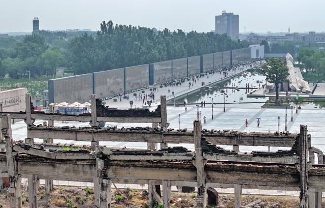 (260728) -- TANGSHAN, July 28, 2026 (Xinhua) -- An aerial drone photo taken on July 27, 2026 shows people visiting the Tangshan Earthquake Memorial Park in Tangshan, north China's Hebei Province. This year marks the 50th anniversary of the Tangshan Earthquake, a magnitude-7.8 quake that struck the city on July 28, 1976, taking the lives of more than 240,000 people and destroying virtually all buildings in the city.
   Crowds of people visited the Tangshan Earthquake Memorial Park on Tuesday to mourn and remember the victims in the devastating disaster. (Xinhua/Yang Shiyao)