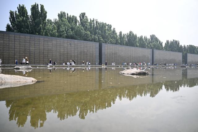 (260728) -- TANGSHAN, July 28, 2026 (Xinhua) -- People visit the Tangshan Earthquake Memorial Park in Tangshan, north China's Hebei Province, July 28, 2026. This year marks the 50th anniversary of the Tangshan Earthquake, a magnitude-7.8 quake that struck the city on July 28, 1976, taking the lives of more than 240,000 people and destroying virtually all buildings in the city.
   Crowds of people visited the Tangshan Earthquake Memorial Park on Tuesday to mourn and remember the victims in the devastating disaster. (Xinhua/Mu Yu)