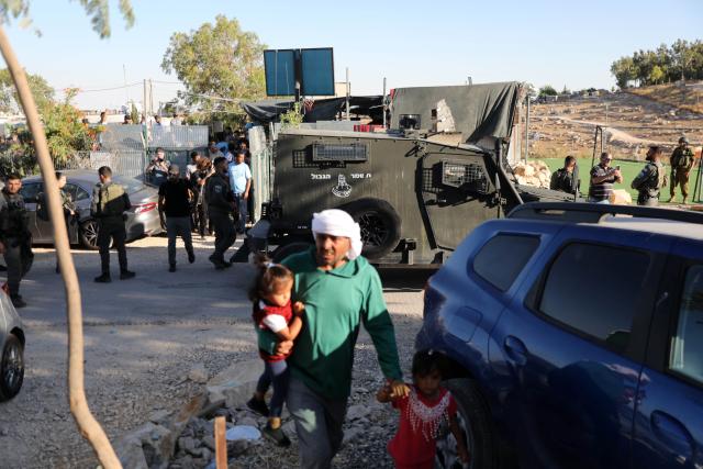 (260728) -- HEBRON, July 28, 2026 (Xinhua) -- Israeli forces raid the village of Umm al-Kheir in the Masafer Yatta area, south of Hebron, the West Bank, during an event held to protest Israeli settler violence, July 28, 2026. (Photo by Mamoun Wazwaz/Xinhua)
