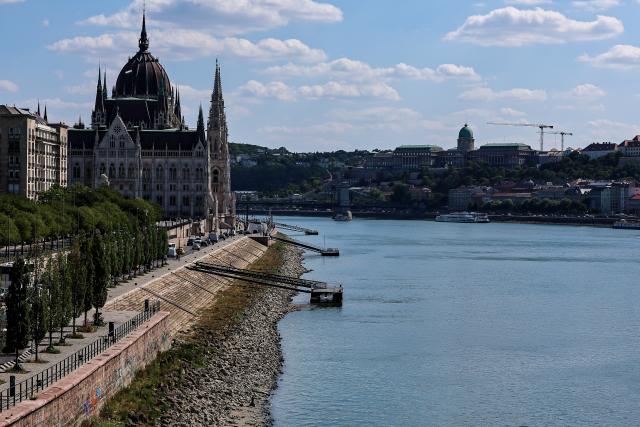 (260728) -- BUDAPEST, July 28, 2026 (Xinhua) -- Photo taken on July 28, 2026 shows the Danube River with its partially exposed riverbed in Budapest, Hungary. The water level of the Danube River in Budapest fell to a record low of 31 centimeters on Tuesday, according to Hungary's General Directorate of Water Management. The reading surpassed the previous record low of 33 centimeters which was measured on October 25, 2018, as prolonged drought and a lack of rainfall continue to affect much of the region. (Photo by David Balogh/Xinhua)