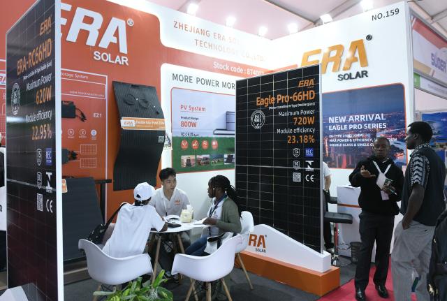 (260729) -- NAIROBI, July 29, 2026 (Xinhua) -- People visit the booth of a Chinese enterprise during the Africa Power & Energy Expo and Africa Solar Expo in Nairobi, Kenya, July 29, 2026. A host of Chinese enterprises took part in the exhibiton that runs from July 29 to 31, parading new technologies and innovations in photovoltaic power, energy storage and power equipment to boost the upgrading of energy infrastructure across Africa. (Xinhua/Liu Qiong)