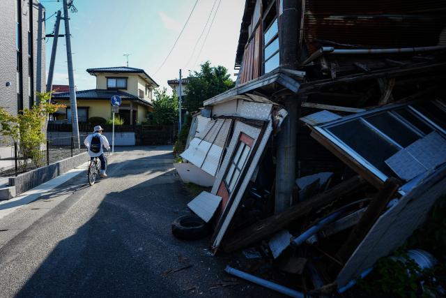 (260729) -- KUMAMOTO, July 29, 2026 (Xinhua) -- This photo taken on July 29, 2026 shows a damaged house after an earthquake in Kumamoto Prefecture, Japan. Twelve people have been confirmed dead following a powerful earthquake that struck Kumamoto Prefecture, southwestern Japan, while six others remain in cardiac arrest, local media reported Wednesday, citing the latest official figures.
   Speaking at a disaster response headquarters meeting held shortly after 4:00 p.m. local time, prefectural officials said that 62 people had also been injured, while at least four people remain unaccounted for, public broadcaster NHK reported. (Xinhua/Jia Haocheng)