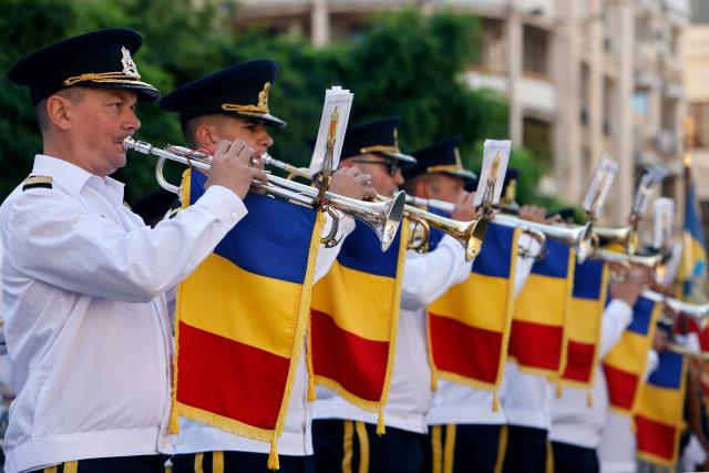 (260729) -- BUCHAREST, July 29, 2026 (Xinhua) -- A military band performs during ceremonies marking the National Anthem Day in Bucharest, Romania, July 29, 2026. (Photo by Cristian Cristel/Xinhua)