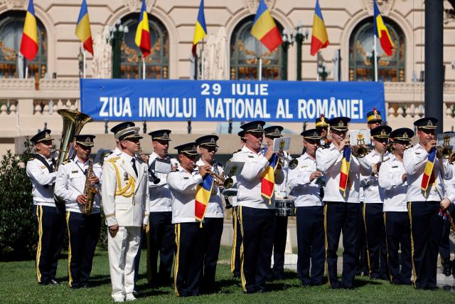 (260729) -- BUCHAREST, July 29, 2026 (Xinhua) -- A military band performs during ceremonies marking the National Anthem Day in Bucharest, Romania, July 29, 2026. (Photo by Cristian Cristel/Xinhua)