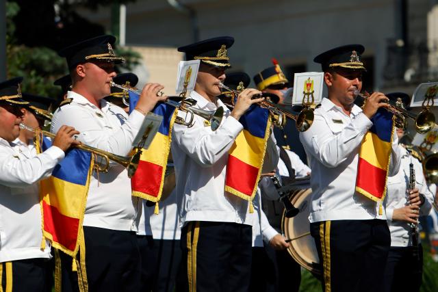 (260729) -- BUCHAREST, July 29, 2026 (Xinhua) -- A military band performs during ceremonies marking the National Anthem Day in Bucharest, Romania, July 29, 2026. (Photo by Cristian Cristel/Xinhua)