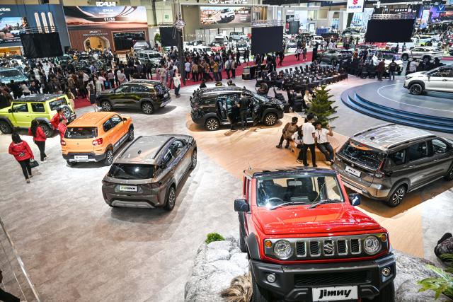 (260729) -- TANGERANG, July 29, 2026 (Xinhua) -- People visit the GAIKINDO Indonesia International Auto Show (GIIAS) 2026 during the Exclusive Media Day in Tangerang, Banten Province, Indonesia, July 29, 2026. The 2026 GIIAS will be held here from July 30 to Aug. 9. (Xinhua/Agung Kuncahya B.)
