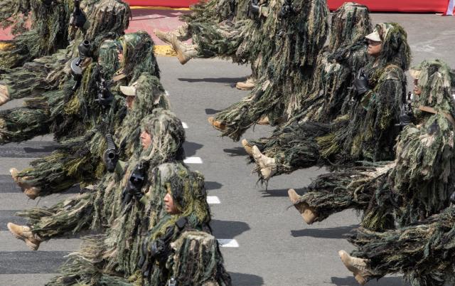 (260729) -- LIMA, July 29, 2026 (Xinhua) -- Soldiers participate in a parade to commemorate the 205th anniversary of Peru's independence in Lima, Peru, July 29, 2026. (Photo by Mariana Bazo/Xinhua)