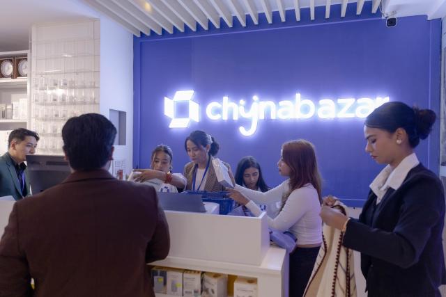 (260730) -- LALITPUR, July 30, 2026 (Xinhua) -- People visit an experience store of Chynabazar.com, a new e-commerce platform serving Nepali consumers with products made in China, in Lalitpur, Nepal, July 29, 2026. TO GO WITH "Nepal's new e-commerce platform to deliver China-made goods from factories to consumers" (Photo by Sulav Shrestha/Xinhua)