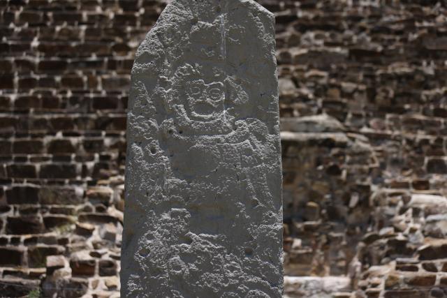 (260730) -- OAXACA, July 30, 2026 (Xinhua) -- This photo taken on July 29, 2026 shows a stone carving depicting a human figure at the Monte Alban archaeological site in Oaxaca, Mexico. Built around 500 B.C., Monte Alban is located in the southern Mexican state of Oaxaca. It was inscribed on the UNESCO World Heritage List in 1987. (Xinhua/Liu Wenhui)