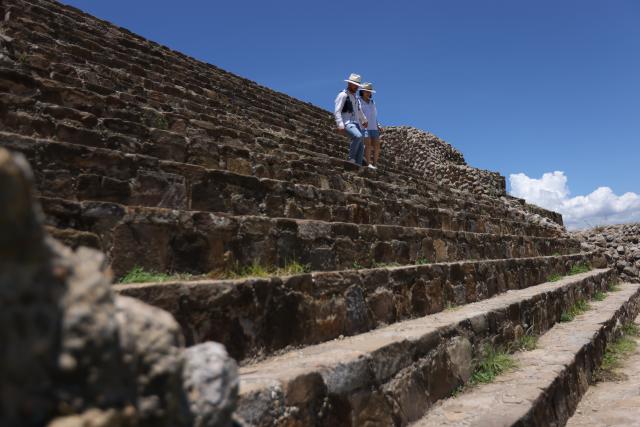 (260730) -- OAXACA, July 30, 2026 (Xinhua) -- Visitors tour the Monte Alban archaeological site in Oaxaca, Mexico, on July 29, 2026. Built around 500 B.C., Monte Alban is located in the southern Mexican state of Oaxaca. It was inscribed on the UNESCO World Heritage List in 1987. (Xinhua/Liu Wenhui)