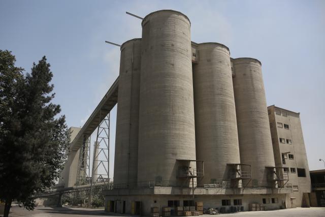 (260730) -- BAGHLAN, July 30, 2026 (Xinhua) -- This photo taken on July 15, 2026 shows a view of a cement factory in Pul-e-Khumri city, Baghlan province, Afghanistan. TO GO WITH "Feature: Old wheels, new hope: Afghan state-owned factories feed families, fuel the future" (Photo by Saifurahman Safi/Xinhua)