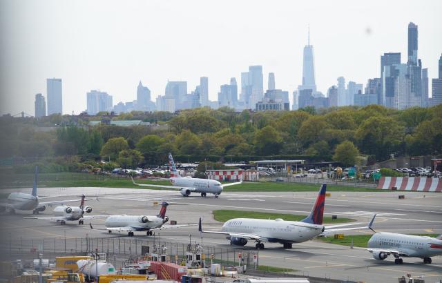 (260730) -- NEW YORK, July 30, 2026 (Xinhua) -- Planes line up to take off at LaGuardia Airport in New York, the United States, April 23, 2026. U.S. gross domestic product (GDP) growth slowed unexpectedly in the second quarter, with the economy expanding at an annualized rate of 1.5 percent, while underlying inflation metrics remained stubbornly high, official data showed on Thursday. (Xinhua/Zhang Fengguo)
