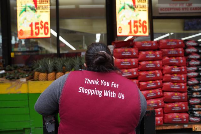 (260730) -- NEW YORK, July 30, 2026 (Xinhua) -- A worker arranges goods at a supermarket in New York, the United States, May 8, 2026. U.S. gross domestic product (GDP) growth slowed unexpectedly in the second quarter, with the economy expanding at an annualized rate of 1.5 percent, while underlying inflation metrics remained stubbornly high, official data showed on Thursday. (Xinhua/Zhang Fengguo)