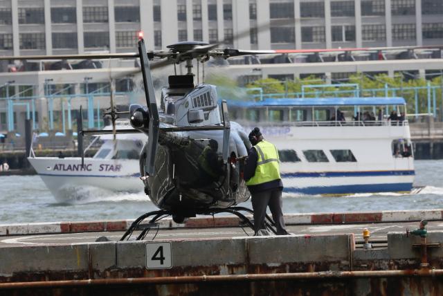 (260730) -- NEW YORK, July 30, 2026 (Xinhua) -- A man refuels a helicopter at the Port of New York and New Jersey, the United States, April 29, 2026. U.S. gross domestic product (GDP) growth slowed unexpectedly in the second quarter, with the economy expanding at an annualized rate of 1.5 percent, while underlying inflation metrics remained stubbornly high, official data showed on Thursday. (Xinhua/Zhang Fengguo)